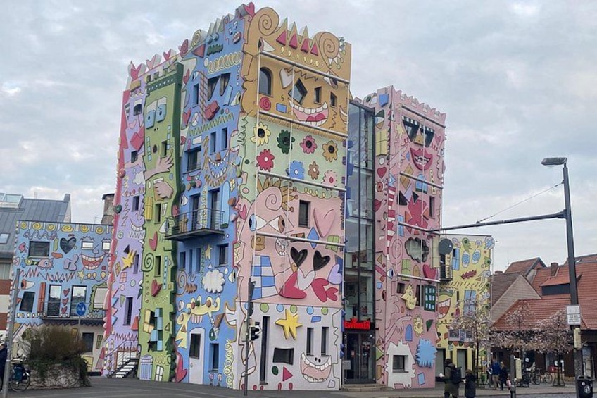 A colorful building with various patterns and designs. 2