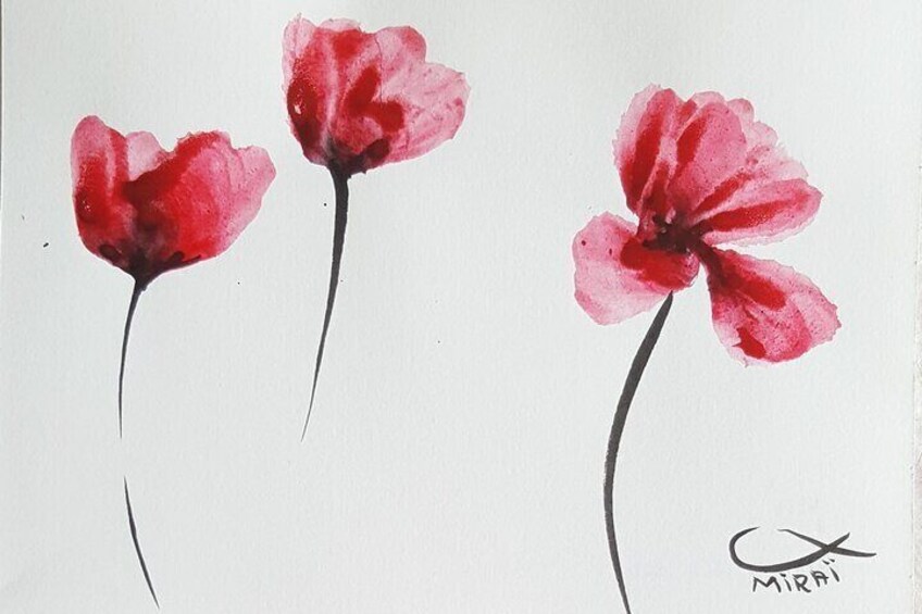 Tres flores rojas sobre un fondo blanco. 3