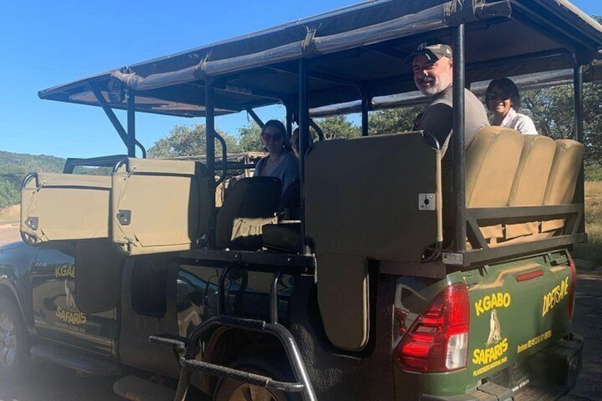 A safari vehicle with 'Kgalagadi' and 'SAFARI' written on it. 5