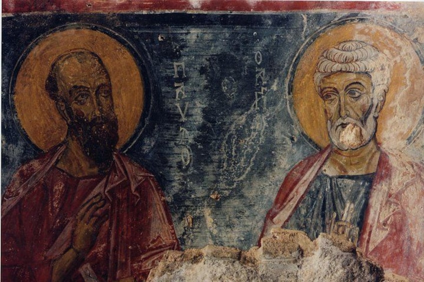 Een religieus icoon met twee figuren, waarvan één een halo draagt en de ander een kruis. 4
