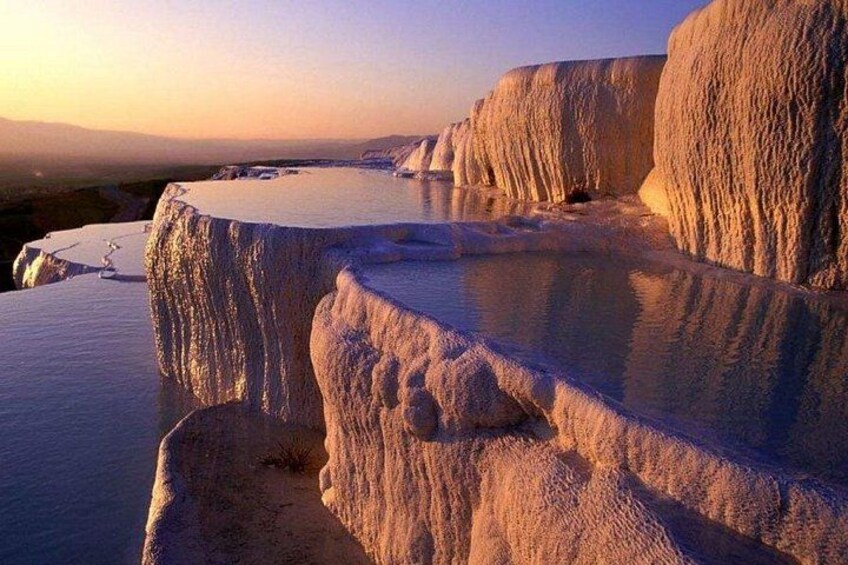 Terraced limestone formations at sunset. 2
