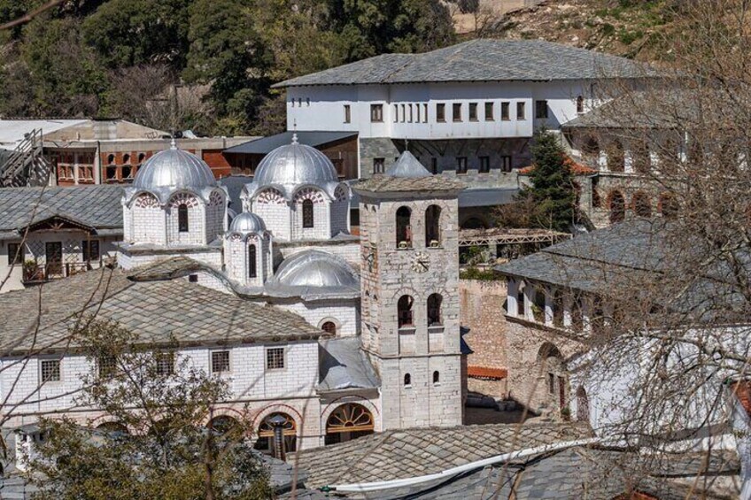 A historic church with multiple domes and a bell tower. 4