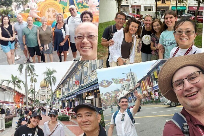 A group of people in a city street with buildings and palm trees. 3