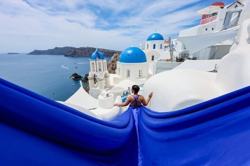 Flying Dress Photoshoot in Santorini, Blue Domes and Caldera View 1
