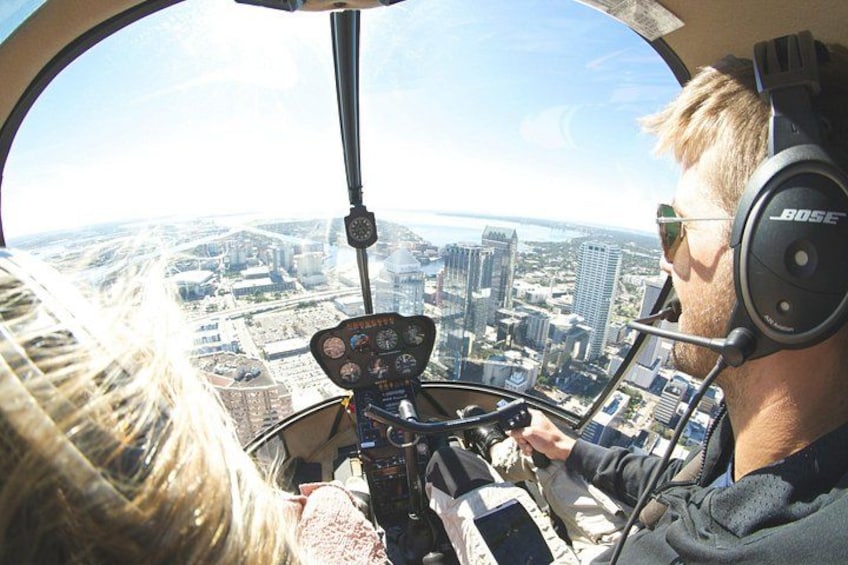 Cockpit view of flyVENTURE helicopter over downtown Tampa 4