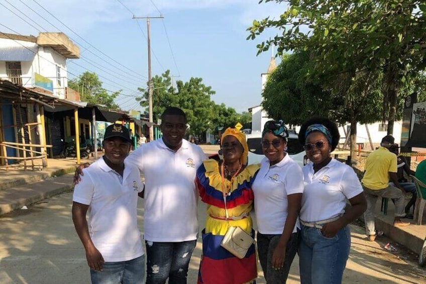 A group of people standing on a street. 5