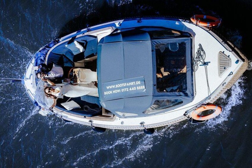 A boat with a website URL and phone number on the side. 5
