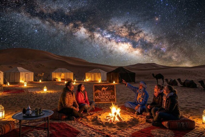 A desert night scene with tents, a campfire, and a sign reading 'STARRY MOROCCO TOURS.' 5