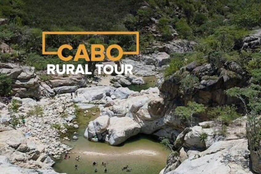 A rural landscape with a rocky terrain and a small body of water. 5