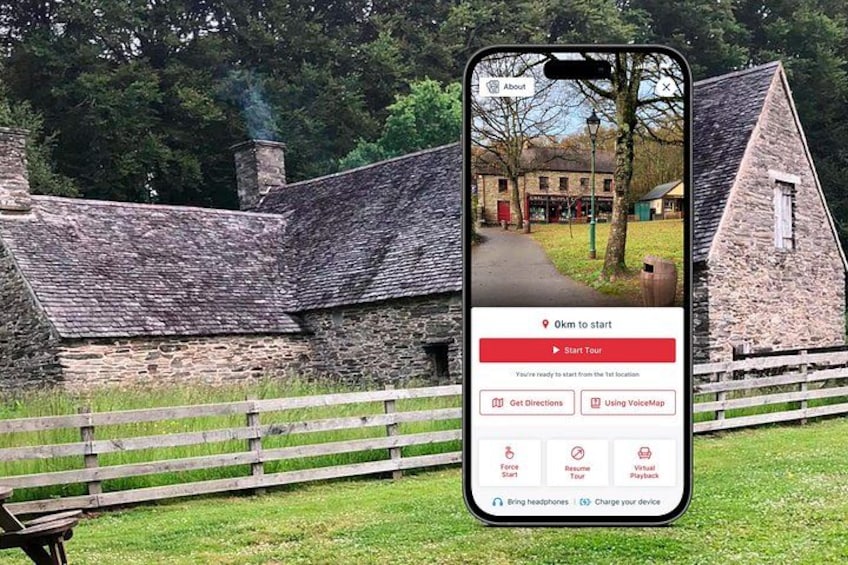 Ein Smartphone zeigt eine Karte mit der Meldung '9 km bis zum Start', einer Schaltfläche 'Tour starten' sowie Optionen für 'Wegbeschreibung' und 'VoiceMap verwenden'. 1