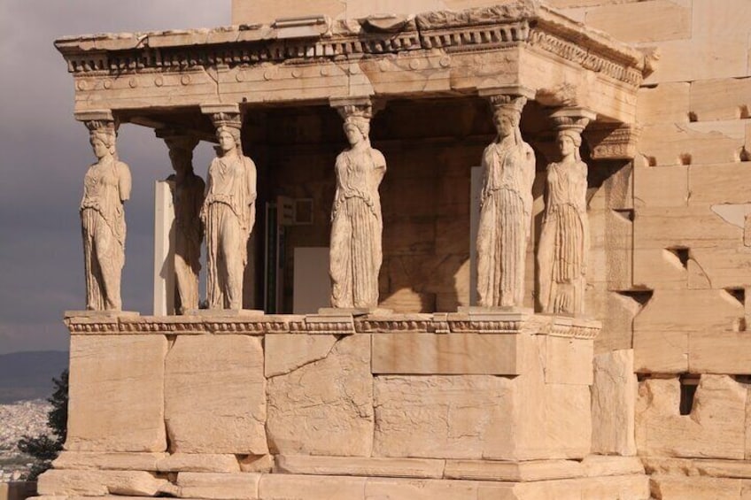 A classical Greek temple with Doric columns and a pediment. 2