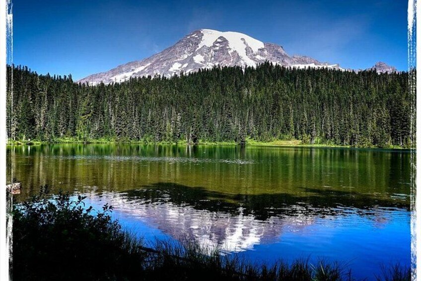 A mountain, a lake, and a forest. 2