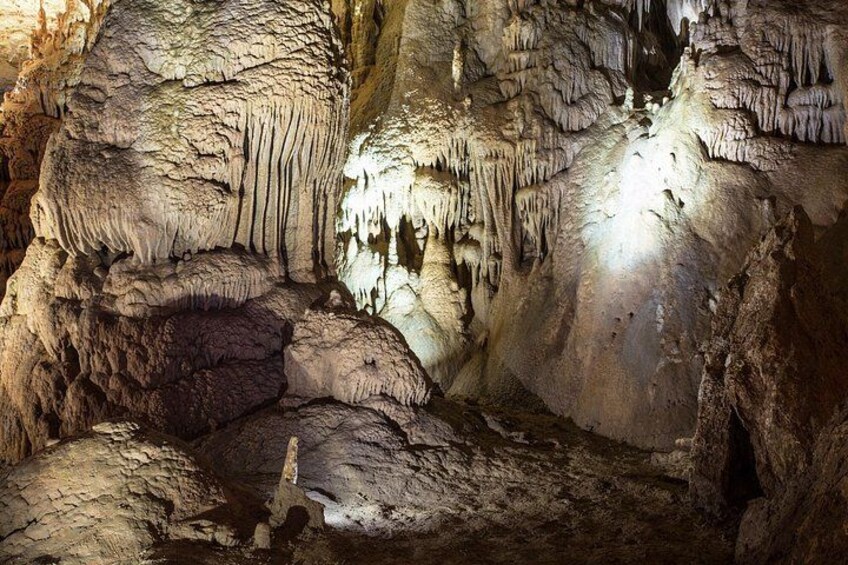 A cave with stalactites and stalagmites. 2