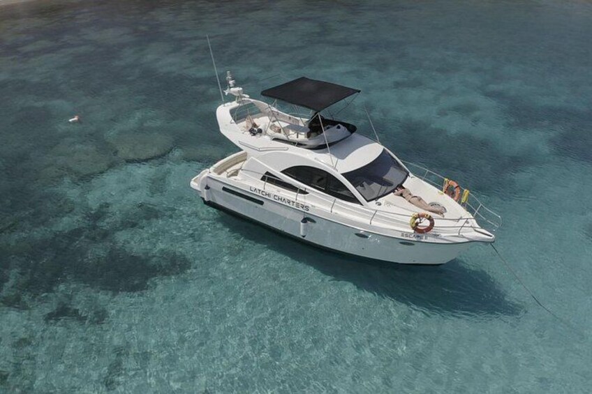 Luxury Rodman 38 Flybridge Private Yacht Charter to Blue Lagoon 2