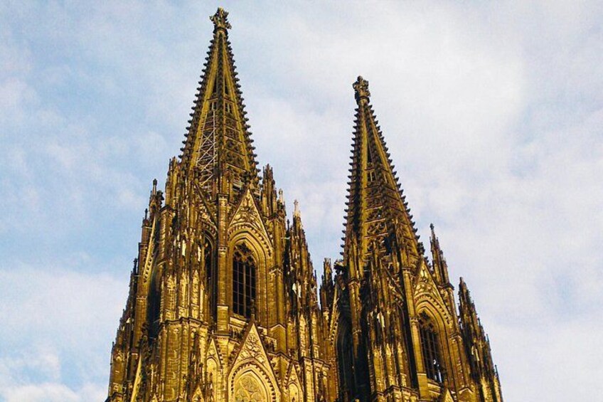 A large, ornate cathedral with twin spires and intricate architectural details. 2