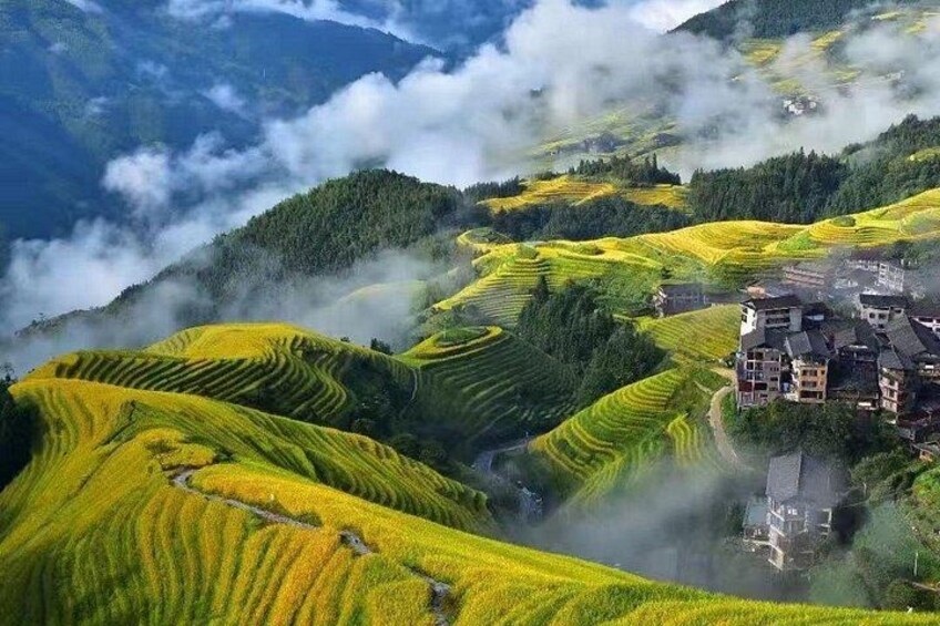 Terraced rice fields, a mountain landscape, and a traditional building. 3