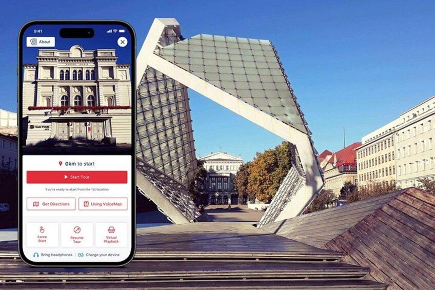 A smartphone displaying a map with a 'Start Tour' button, a building with a glass facade, and a wooden boardwalk. 1