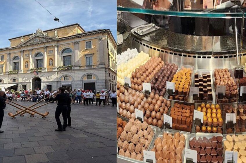 Un edificio histórico con gente reunida en la fachada, y una exhibición de chocolates variados. 3