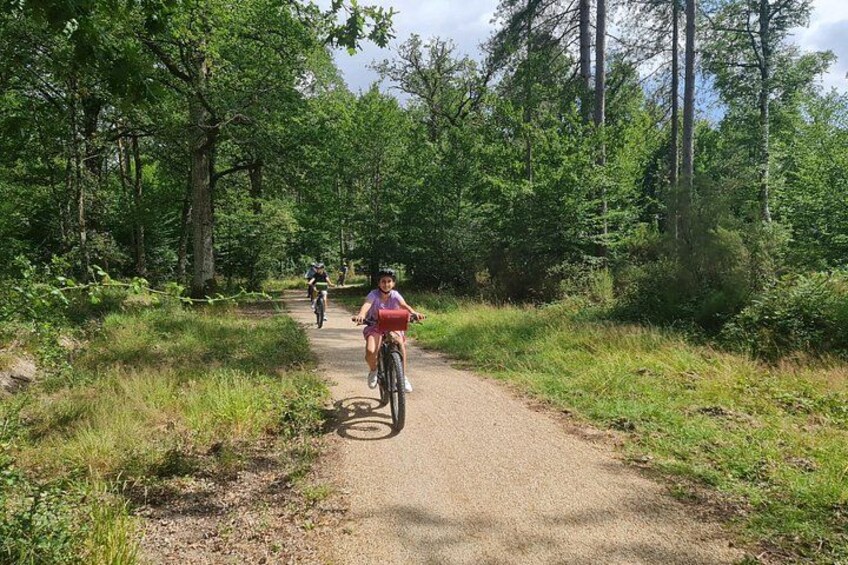 A gravel path with cyclists. 3