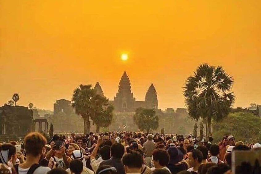 A crowd at Angkor Wat during sunset. 2