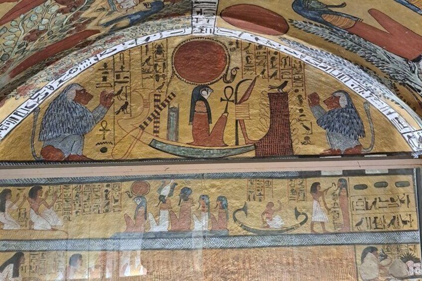 A detailed ancient Egyptian mural with hieroglyphs, a central figure, and a seated figure. 2