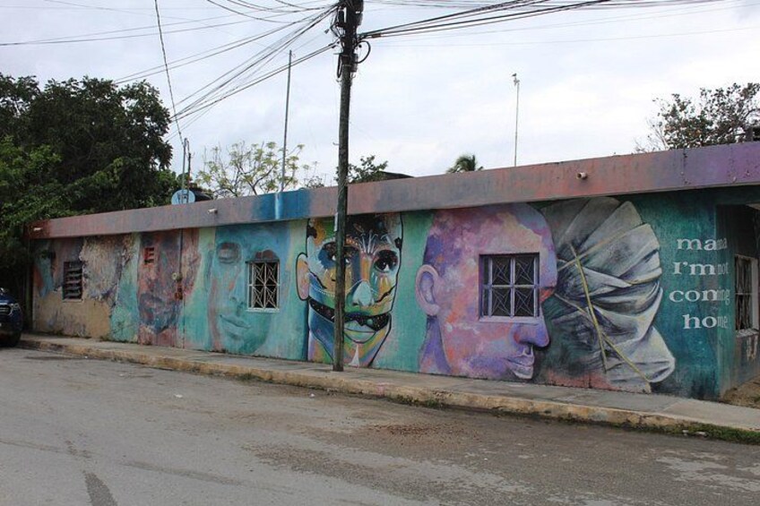 A colorful mural on a building. 5