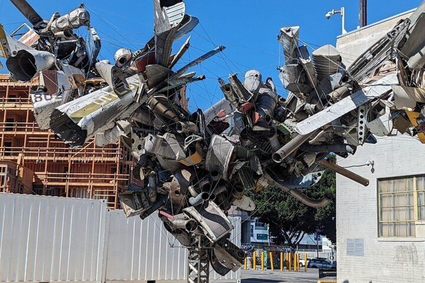A collection of aircraft parts and debris in an urban setting. 3