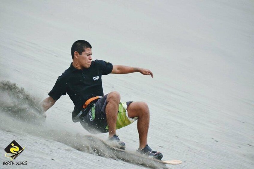 A person surfing on a wave. 1