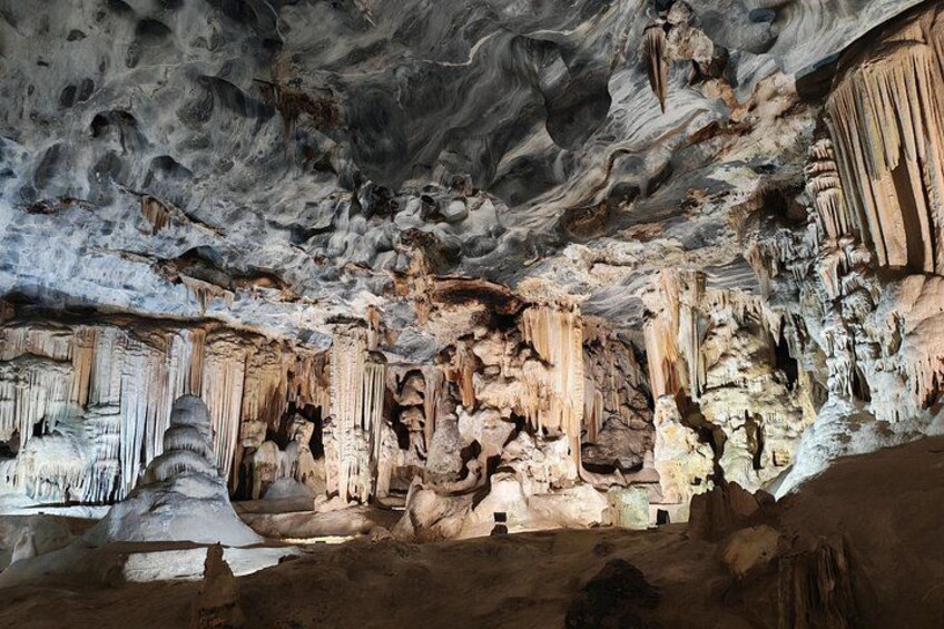 A cave with stalactites and stalagmites. 2