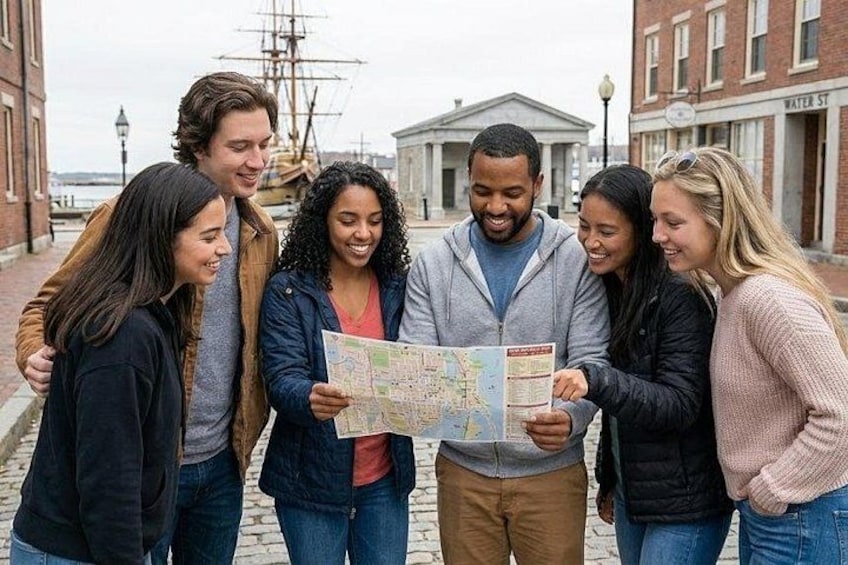 A group of people examining a map in an urban setting with historical buildings and a ship in the background. 1