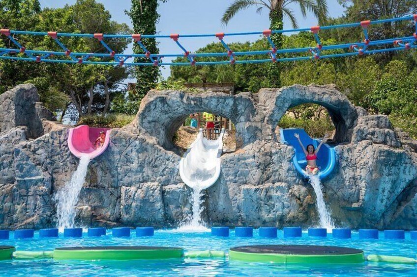 A water park with slides and a pool. 5