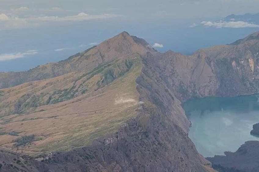 A mountainous landscape with a lake. 2