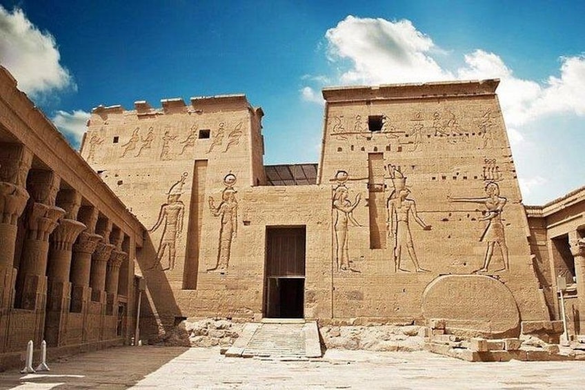 An ancient Egyptian temple with hieroglyphs and columns. 2