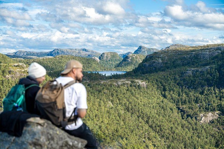 Hikers overlooking forest 4