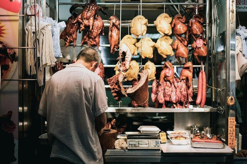 Char siu, roast duck, and crispy pork, this is where fire meets flavor, and the city’s soul is served hot. 1