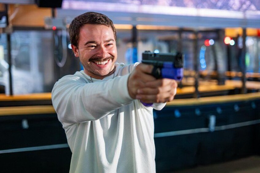 A person aiming a handgun. 3