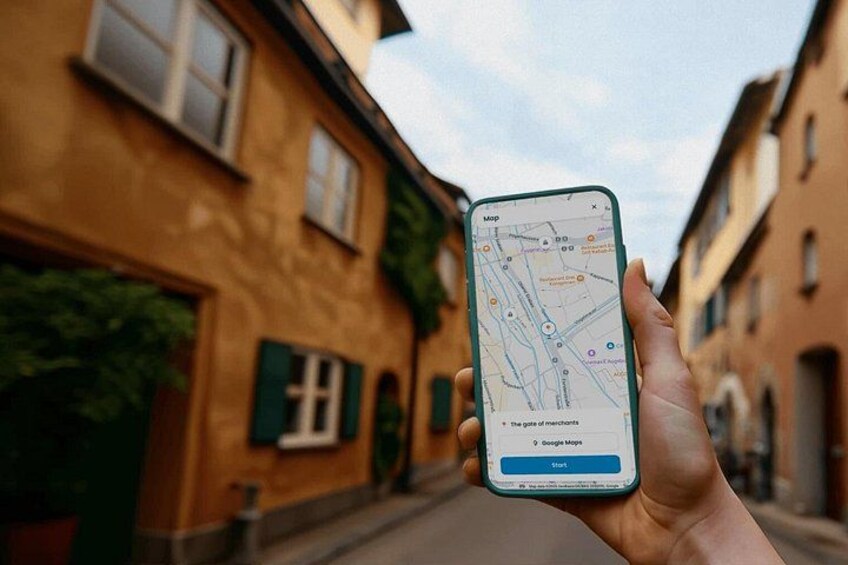 A hand holding a smartphone displaying a map with a 'Start' button. 4