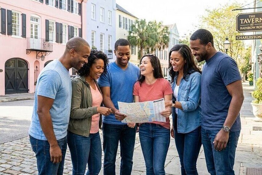 A group of people standing on a street, looking at a map. 1