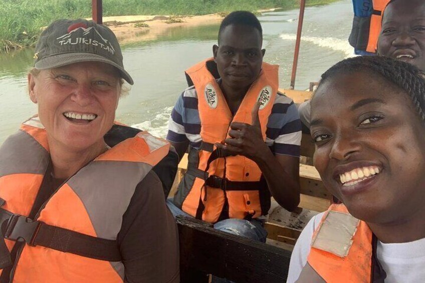 People wearing life jackets on a boat. 1