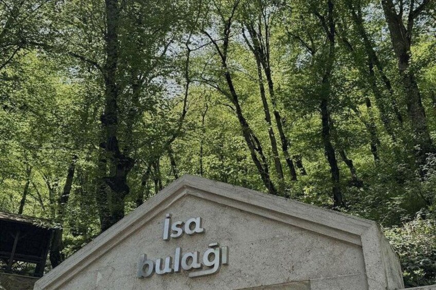 A sign with the text 'isa bulag' in a natural setting with trees. 3