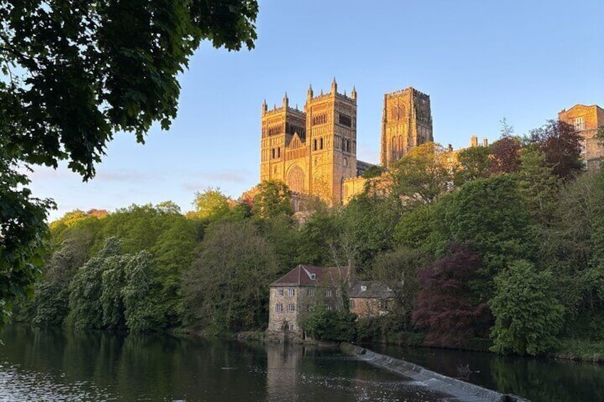 A castle on a hill overlooking a river. 1