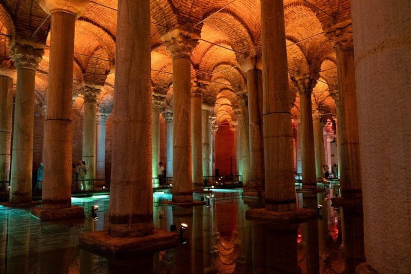 A historical building with large columns and a vaulted ceiling. 3