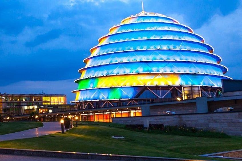 A multi-tiered, illuminated building with a unique, layered design. 3