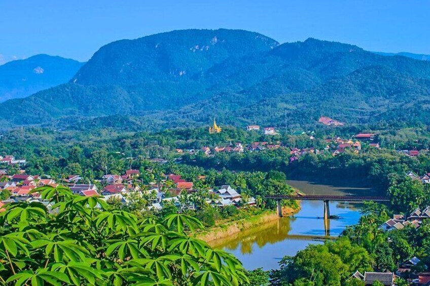 A river, a bridge, and a mountain range. 1