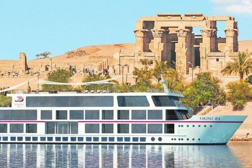A Viking Ra river cruise boat in front of ancient Egyptian ruins. 2