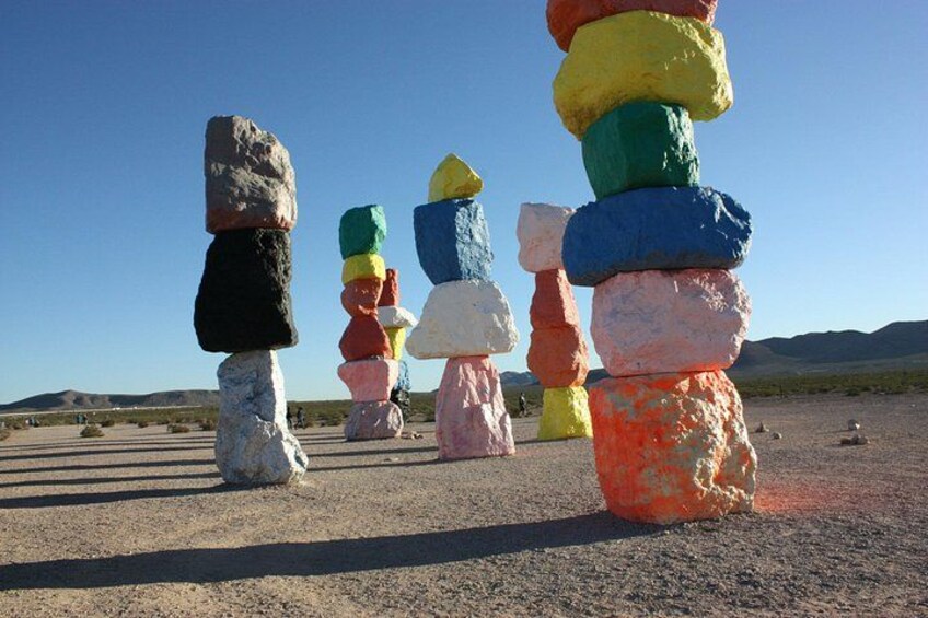 Colorful stone stacks in a desert landscape. 1