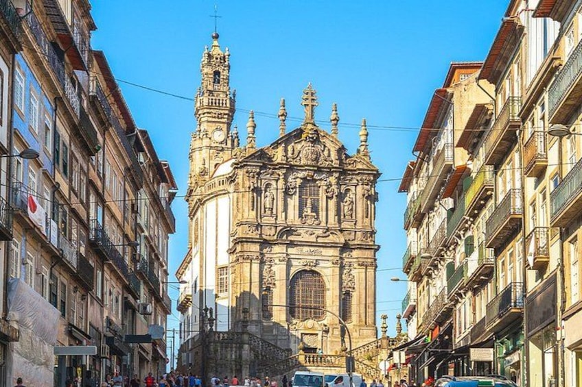 A historic church with intricate architecture, surrounded by urban buildings. 1
