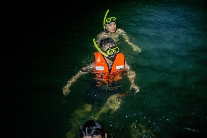 Two people snorkeling in the water. 3