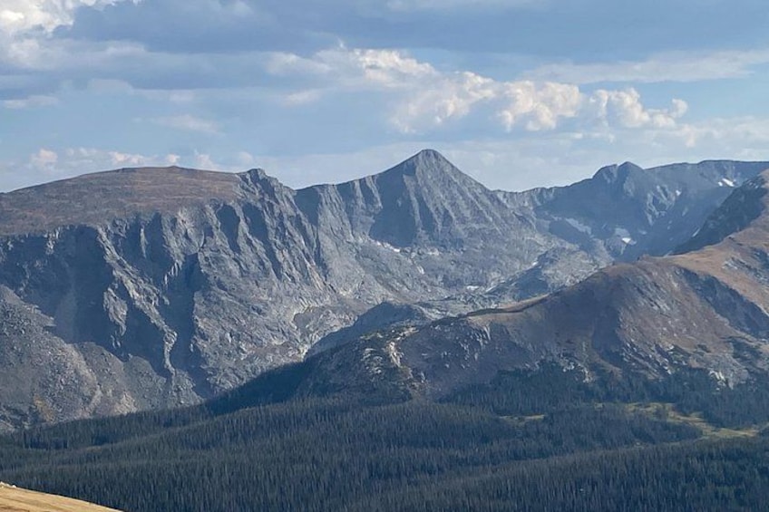 A mountain range with a forested valley. 4