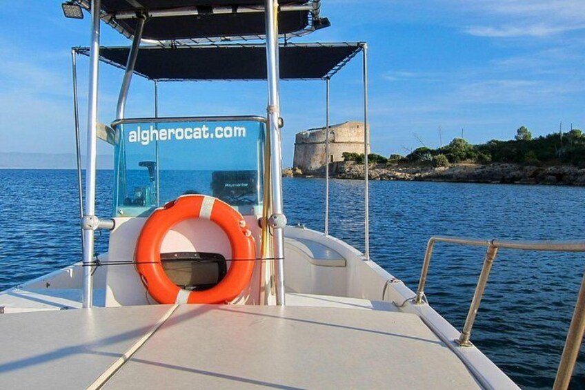 A boat with a life preserver and a website URL on the bow. 3